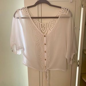 White three quarter sleeve blouse with lace back